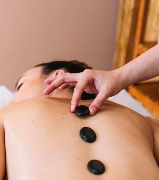 massage-concept-with-stones-womans-back_23-2147821102 massage-concept-with-stones-womans-back_23-2147821102